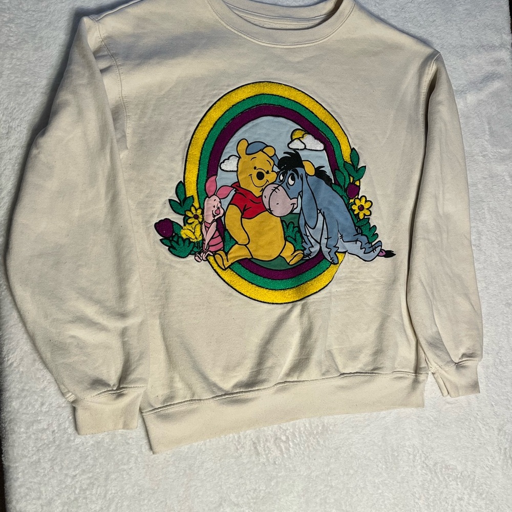 Disney Cream Crewneck Sweatshirt with Winnie the Pooh Rainbow Graphic